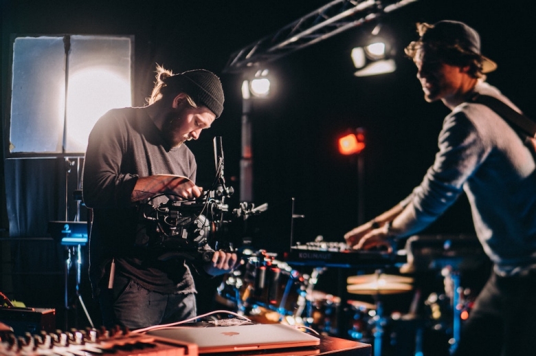 Men working on a camera on a film set